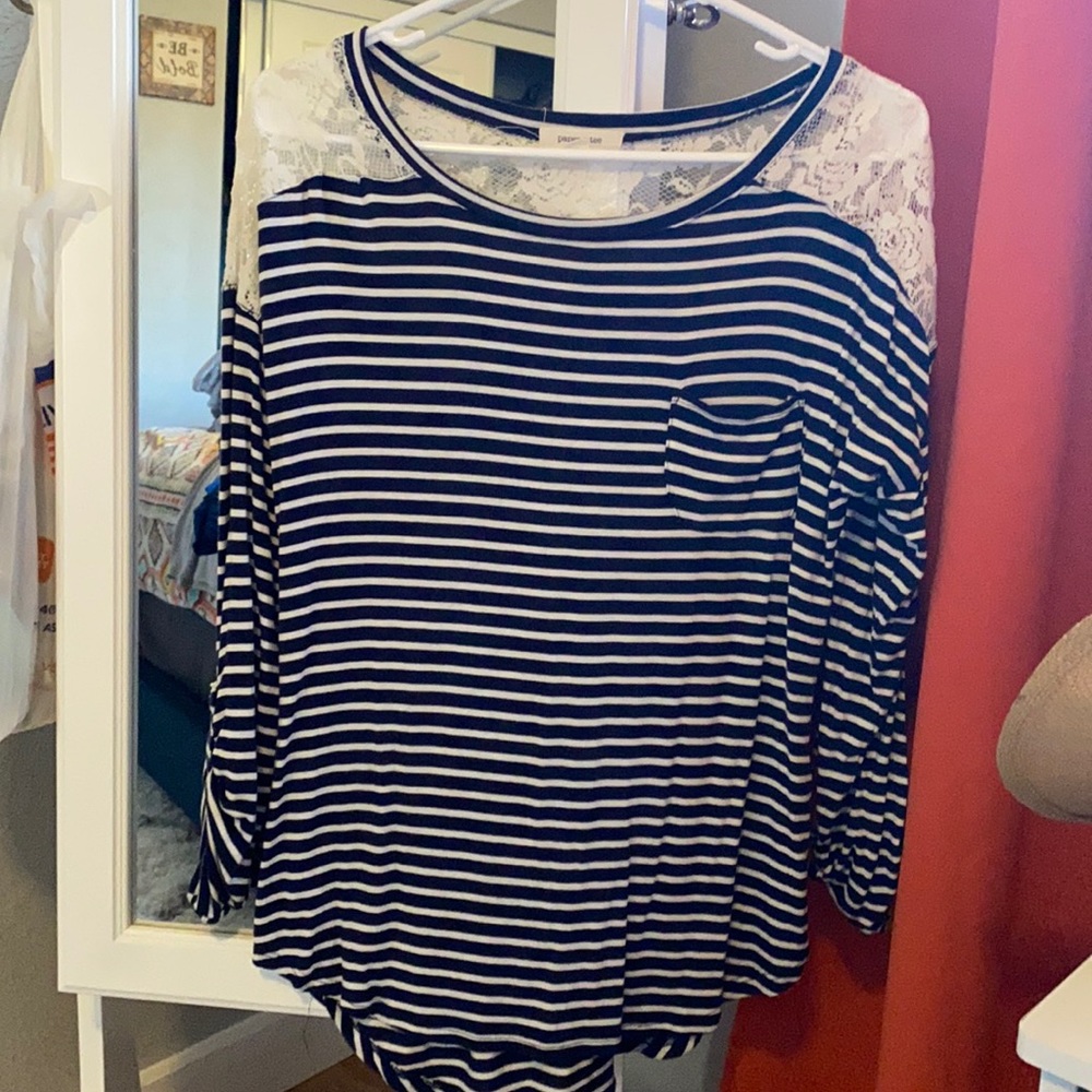 Lightly work blue and white with flora design shirt 3-4 sleeve very comfortable.